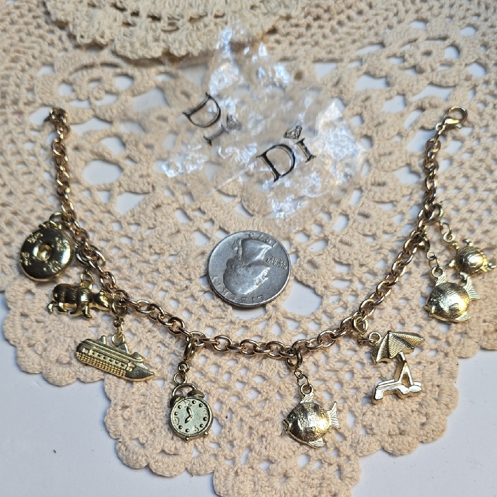 DI" Diamonds International Charm Bracelet And 8 Cruise Ports Charms Gold Tone